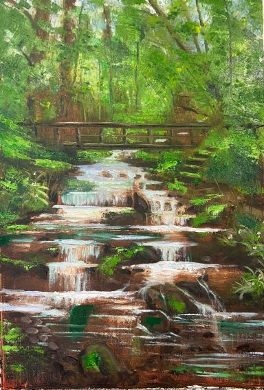 A serene forest scene with a gentle stream flowing over rocks and a wooden bridge.